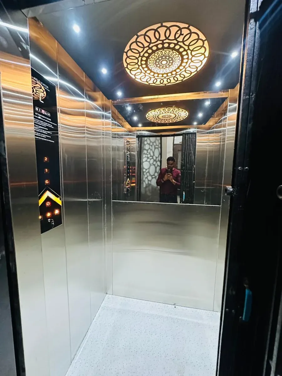 Stainless cabin with a circular gold ceiling feature
